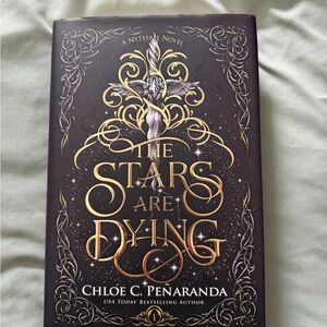 The Stars Are Dying Hardcover Book